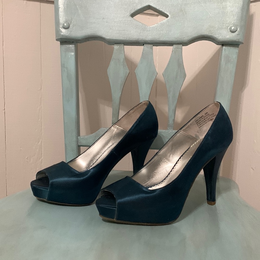 Michael Angelo dark turquoise heels with peep toe. Heel 3 to 4 inches. Size 8.